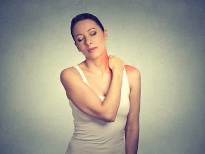 woman shoulder pain rotator cuff
