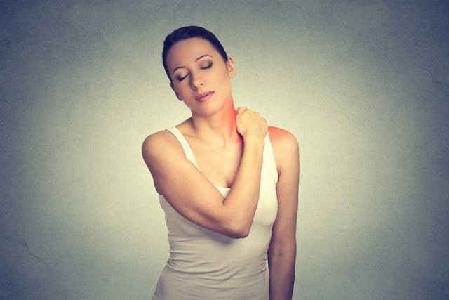 woman shoulder pain rotator cuff